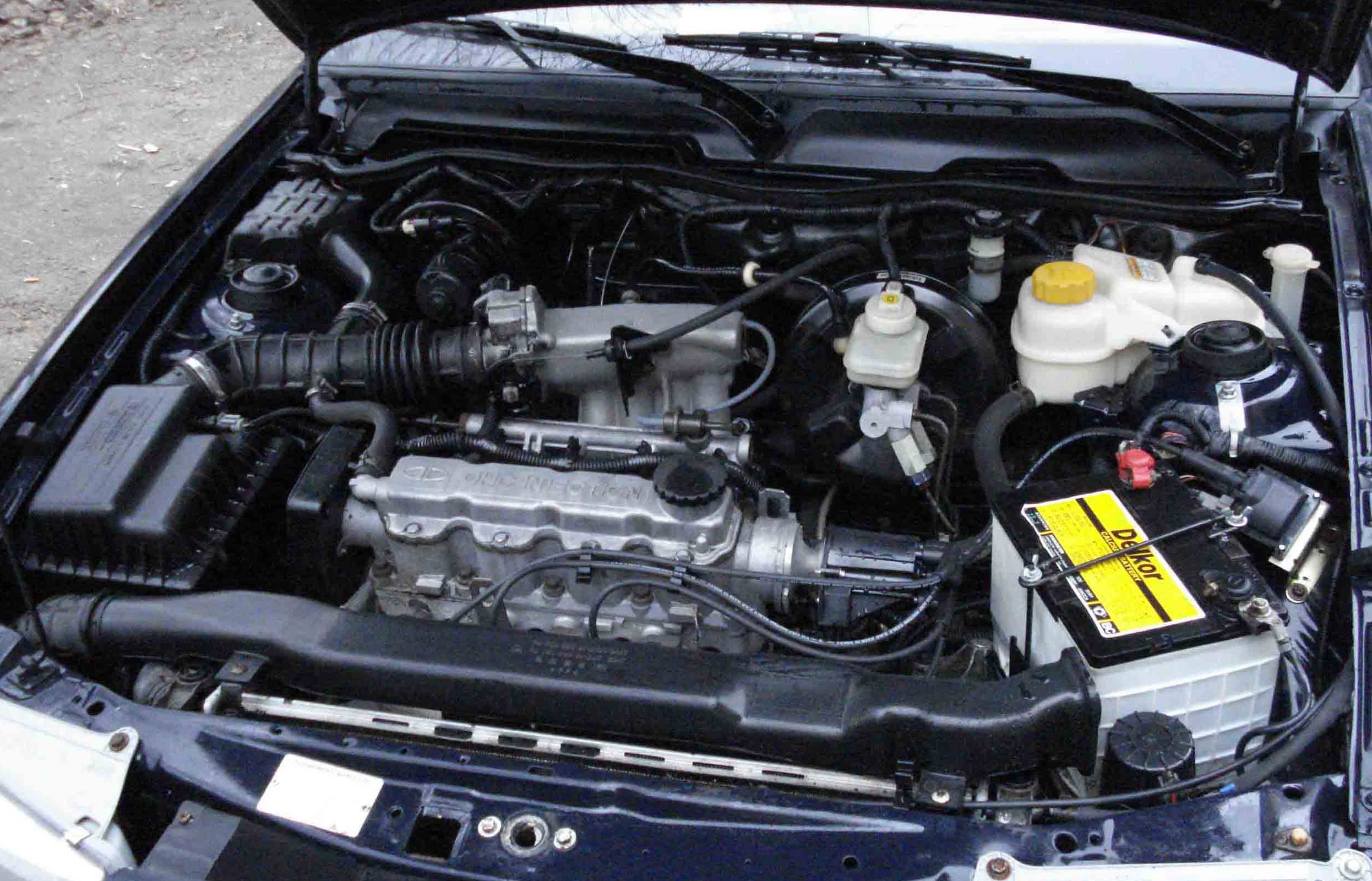 Сколько масла в двигателе дэу. Двигатель Daewoo Nexia 1.5 16 клапанов. Двигатель g15mf Daewoo Nexia. Двигатель Дэу Нексия 1.5 16. Nexia n150 1.6 мотор.